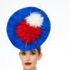 Blue Circular Disc with Gold Flair and Red and White Poms