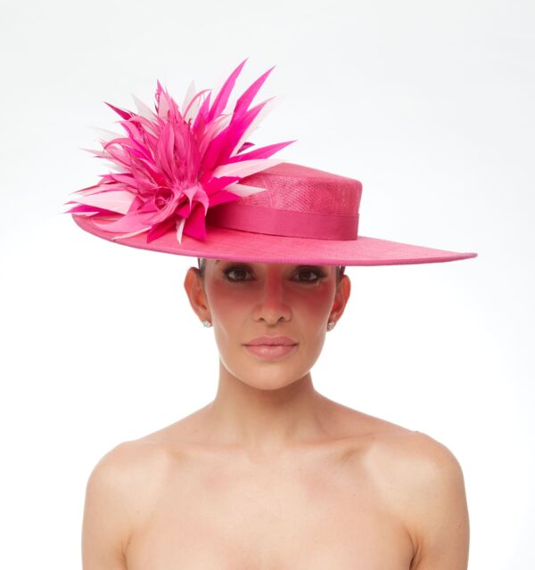 Pink boater with multicolored pink feather adornment