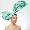 Green floral angled bow with white veiling - Image 4